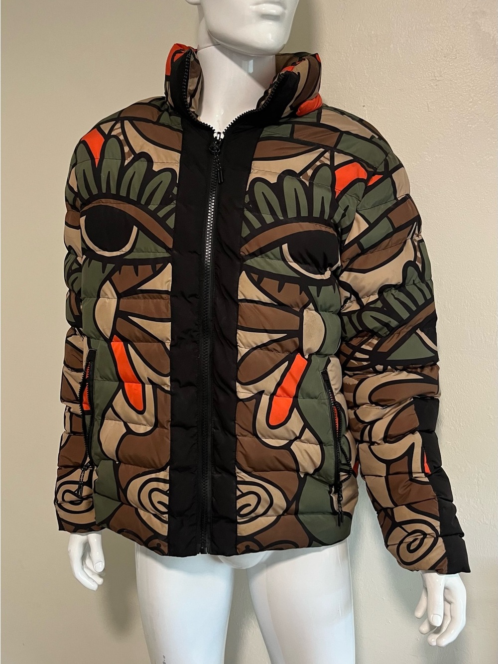 MEN ROKU STUDIO: Abstract Eyes puffer jacket.